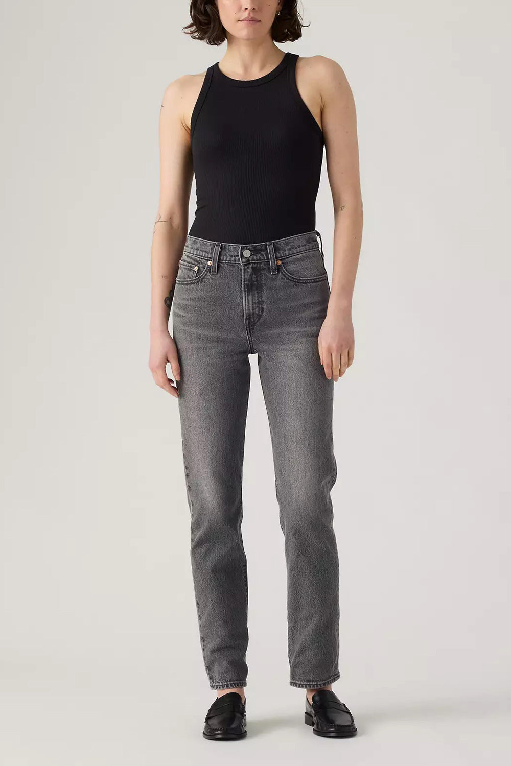 front of a woman wearing Fidenza Slim Leg Grey Denim Pants from La petite garçonne