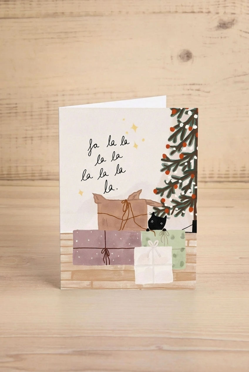 Greeting card from Mimi & August with Christmas design featuring a cat, presents, and tree.