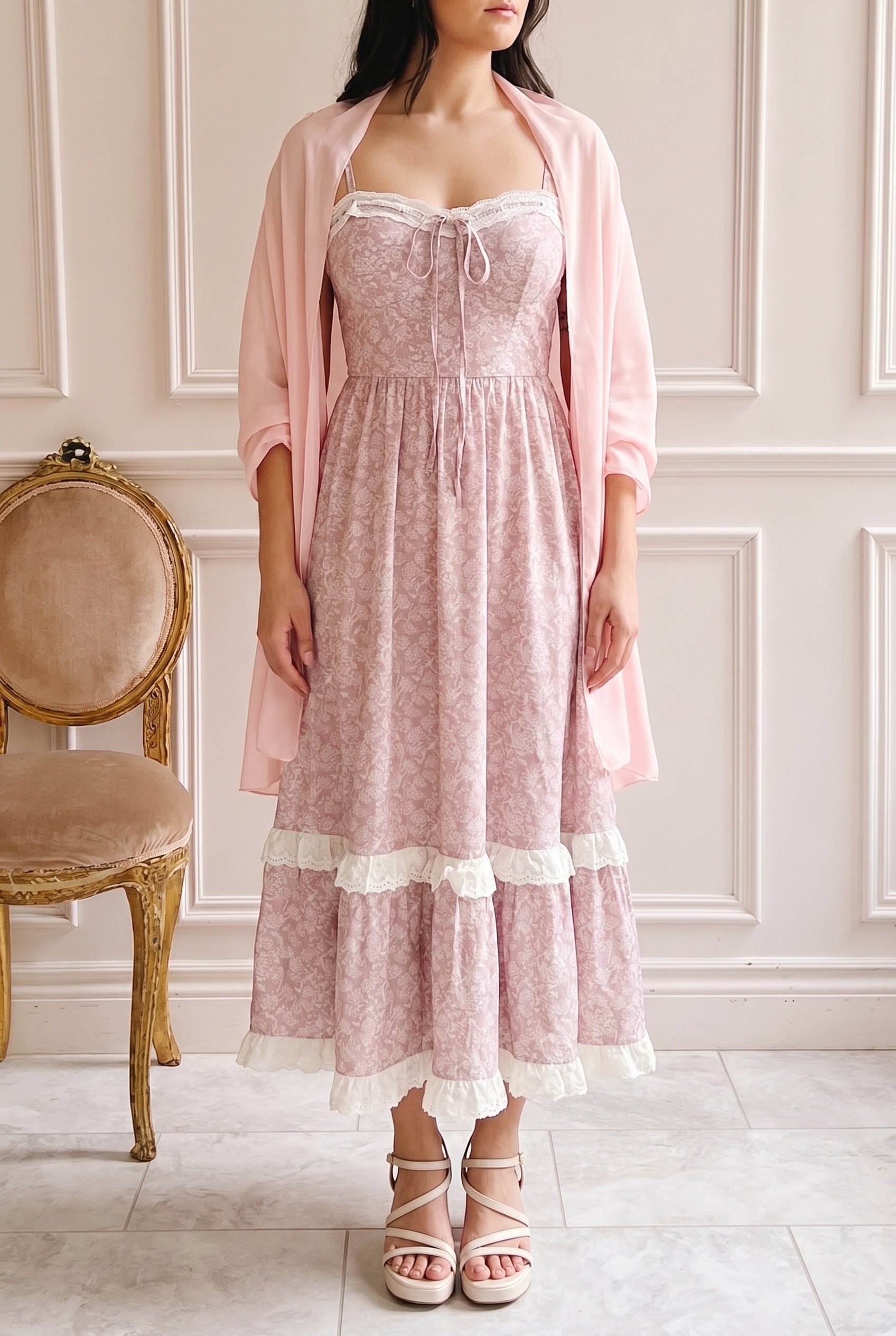 woman wearing Uluria Pink Floral Midi Dress with Sweetheart Neckline at boutique 1861
