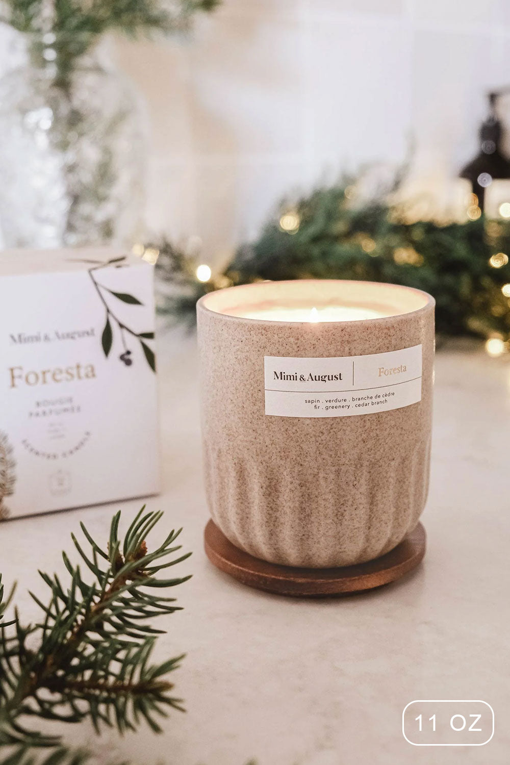 Reusable candle 11 oz fills with the strong scent of the forest from Mimi & August