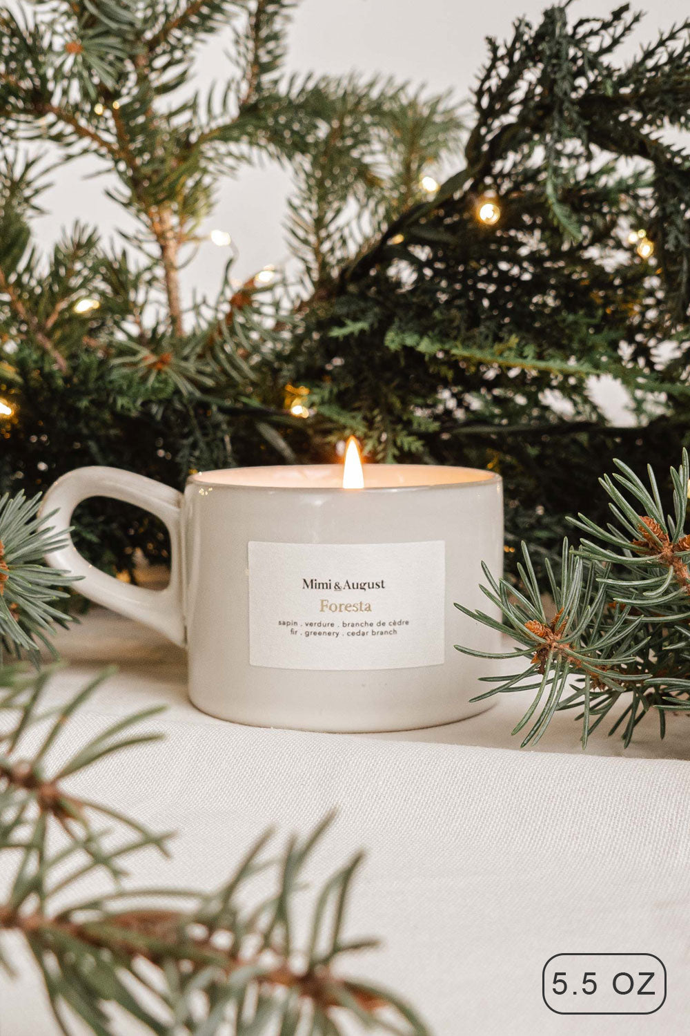 Reusable candle 5.5 oz fills with the strong scent of the forest from Mimi & August