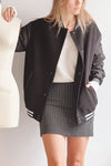 Kokomo Black Oversized Varsity Jacket | La petite garçonne on model