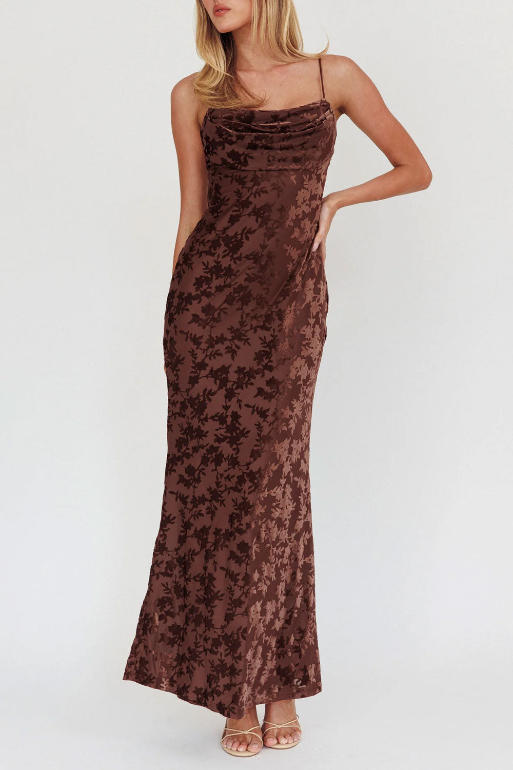 Person wearing Haylin Brown Velvet Floral Fitted Maxi Dress from Boutique 1861