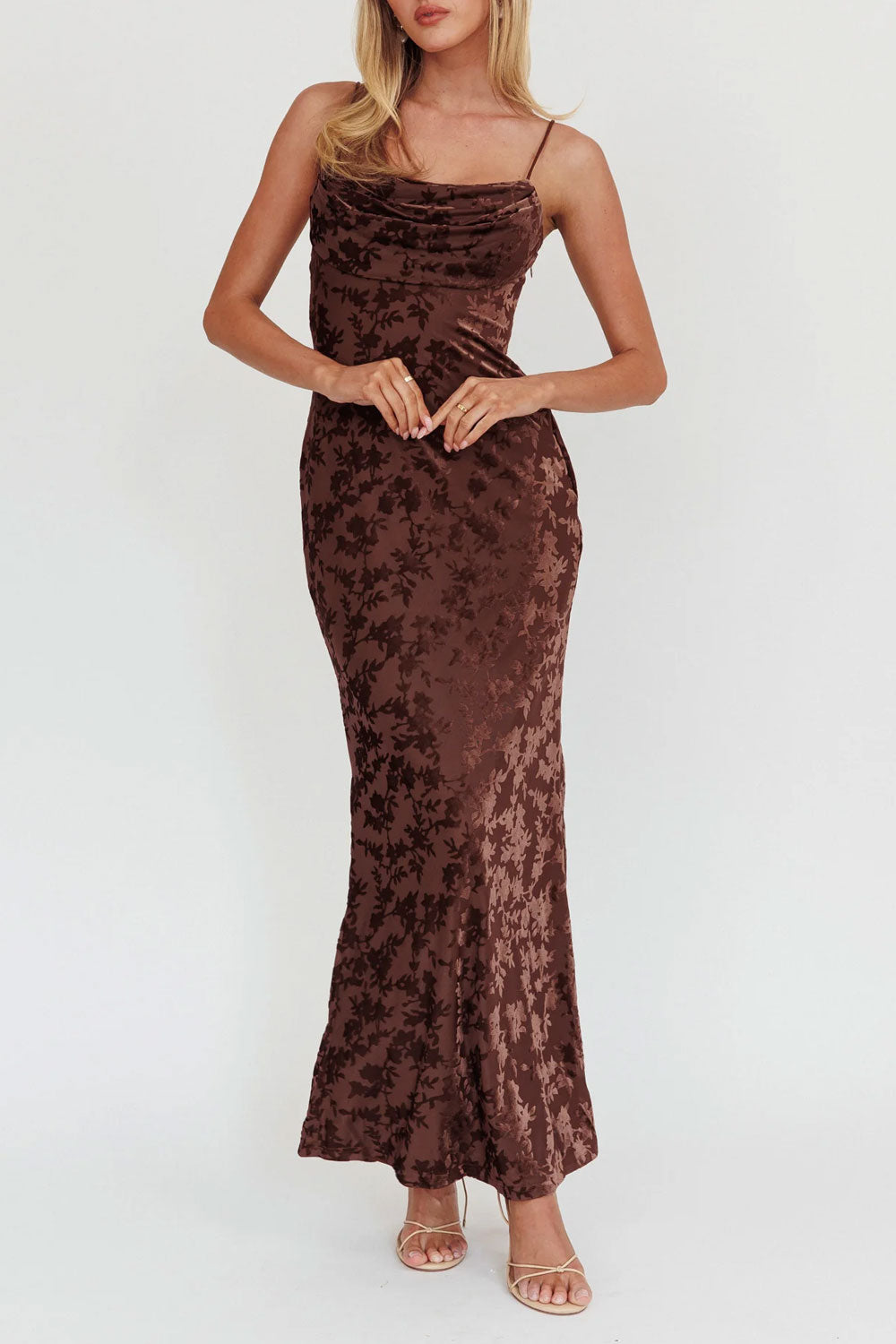 Person wearing Haylin Brown Velvet Floral Fitted Maxi Dress from Boutique 1861