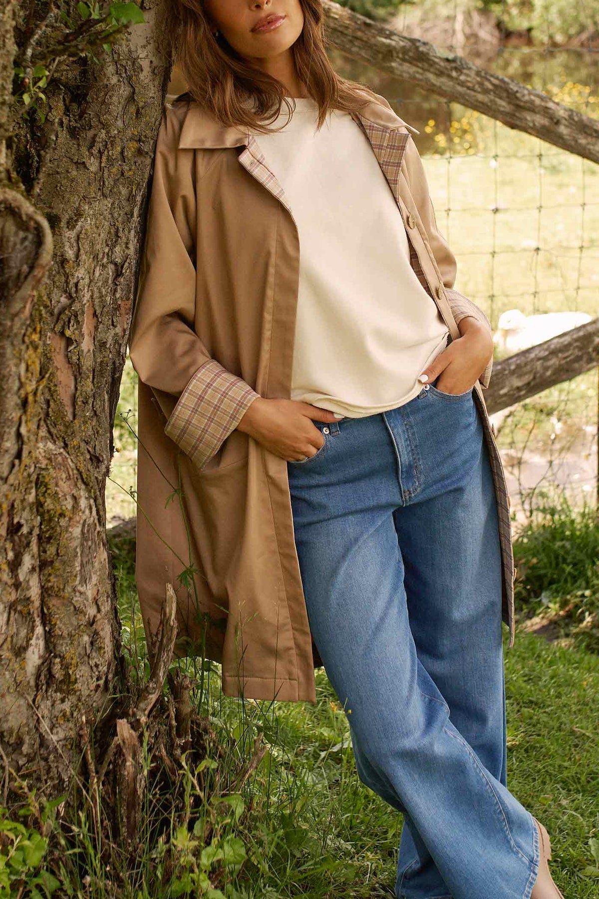 woman wearing Judith Trench Beige Trench-Coat with Plaid Details by Dailystory from La petite garçonne