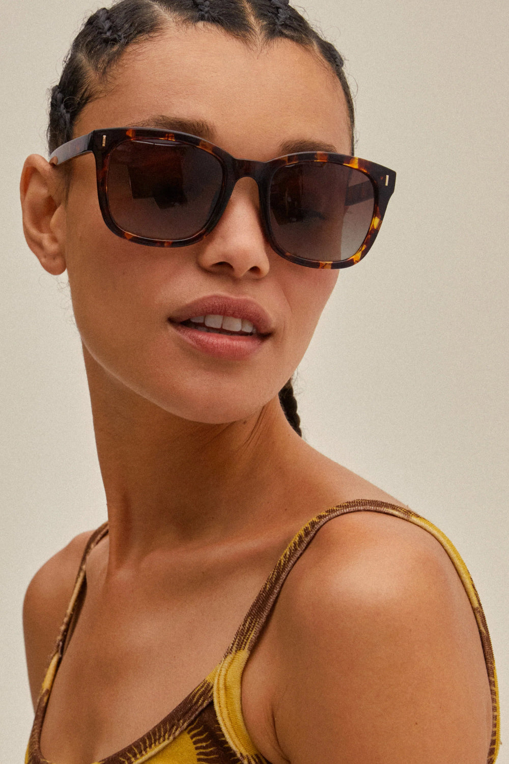 Woman wearing Kattya Sunglasses with tortoise shell frame by Pilgrim available at la petite garçonne