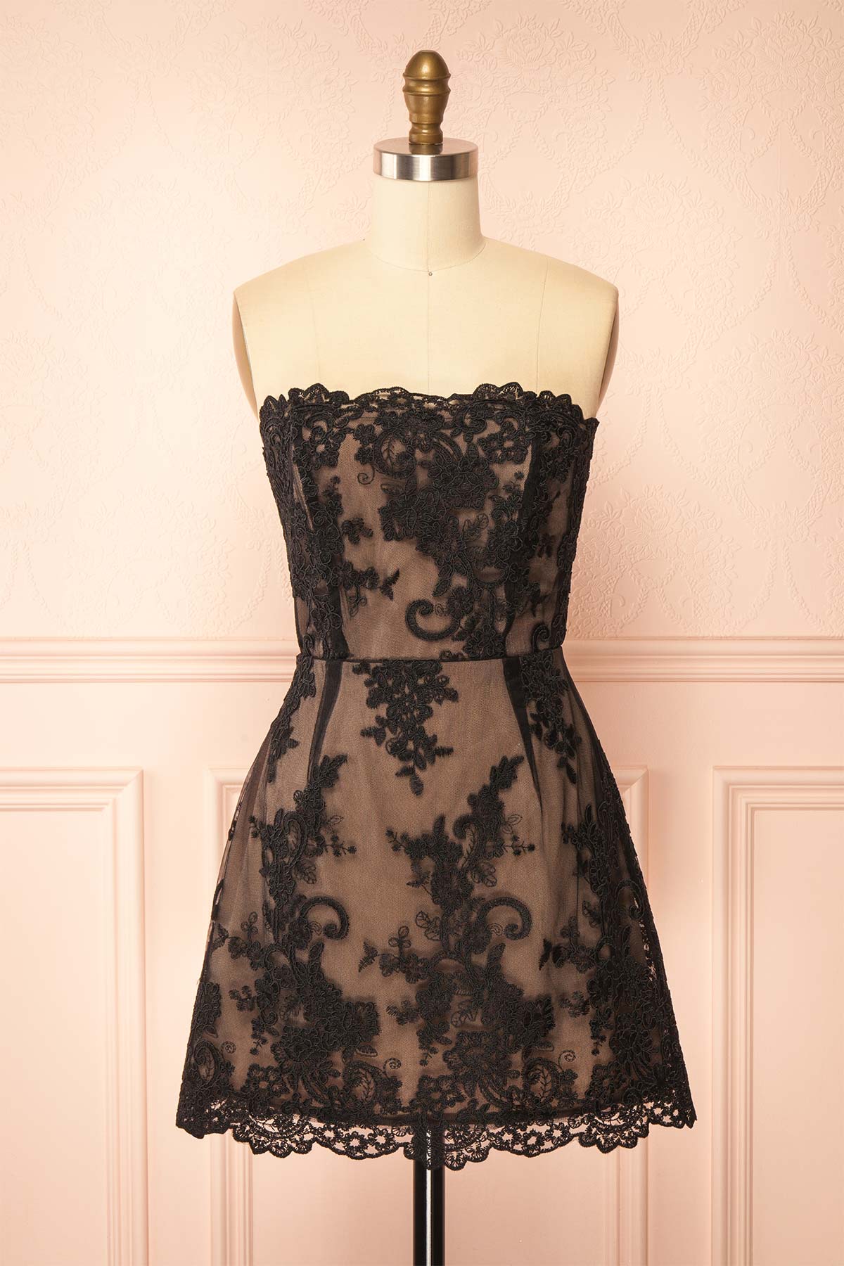Front view of Konilda Black Floral Lace Mini Dress with Boned Bodice at Boutique 1861 