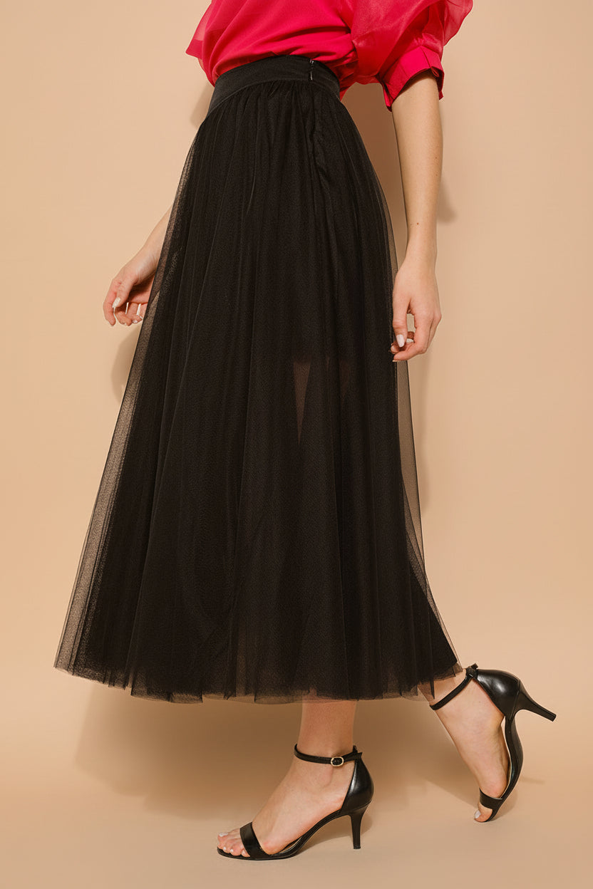 side view of a woman wearing Laurelia Black Maxi Tulle Low Rise Skirt from Boutique 1861 