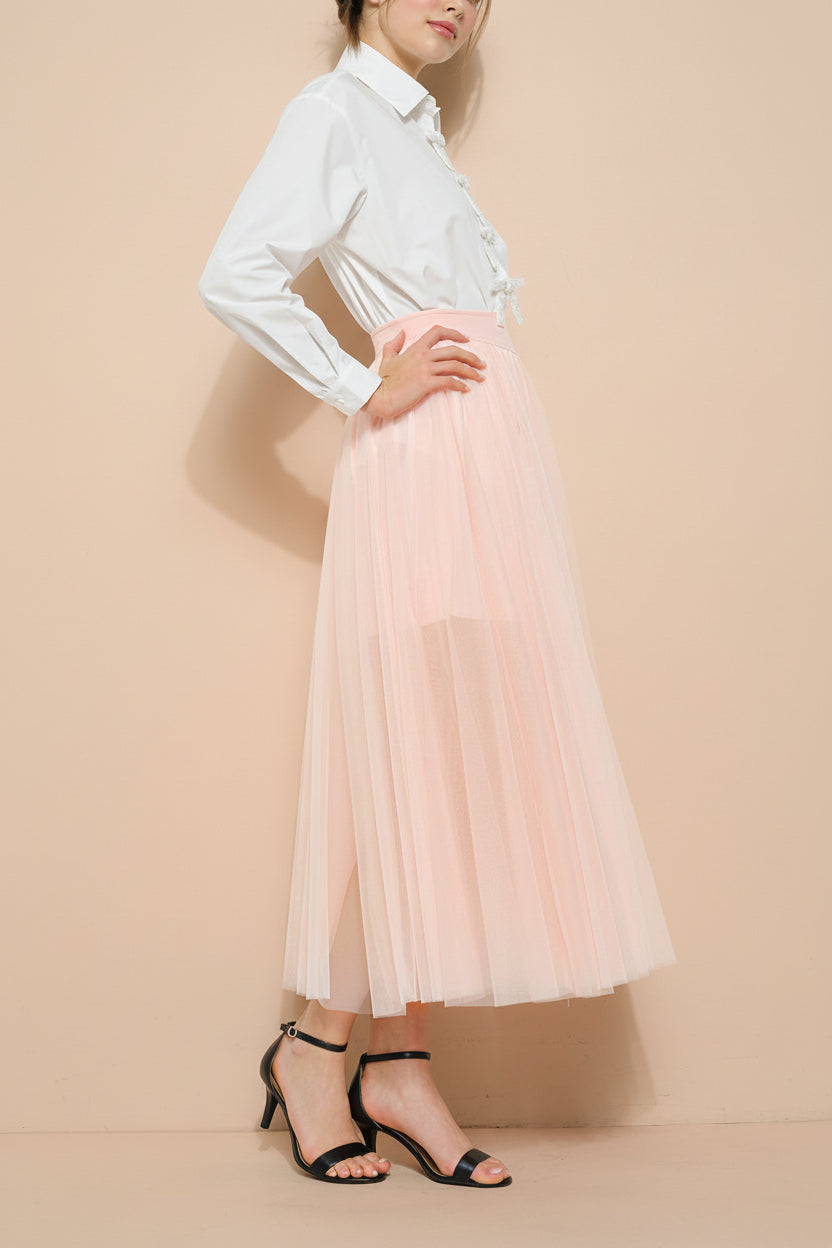 side view of a woman wearing Laurelia Blush Low Rise Tulle Maxi Skirt from Boutique 1861
