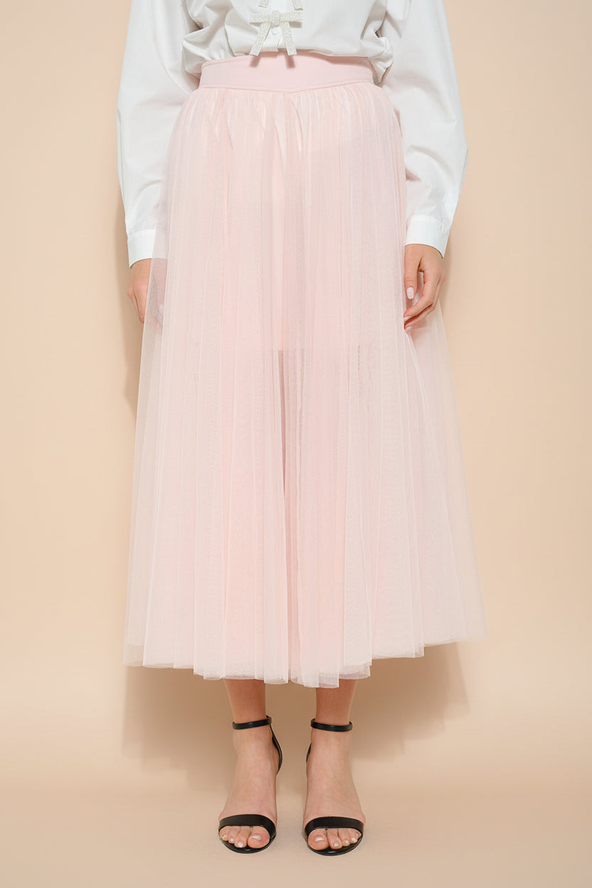 front view of a woman wearing Laurelia Blush Low Rise Tulle Maxi Skirt from Boutique 1861