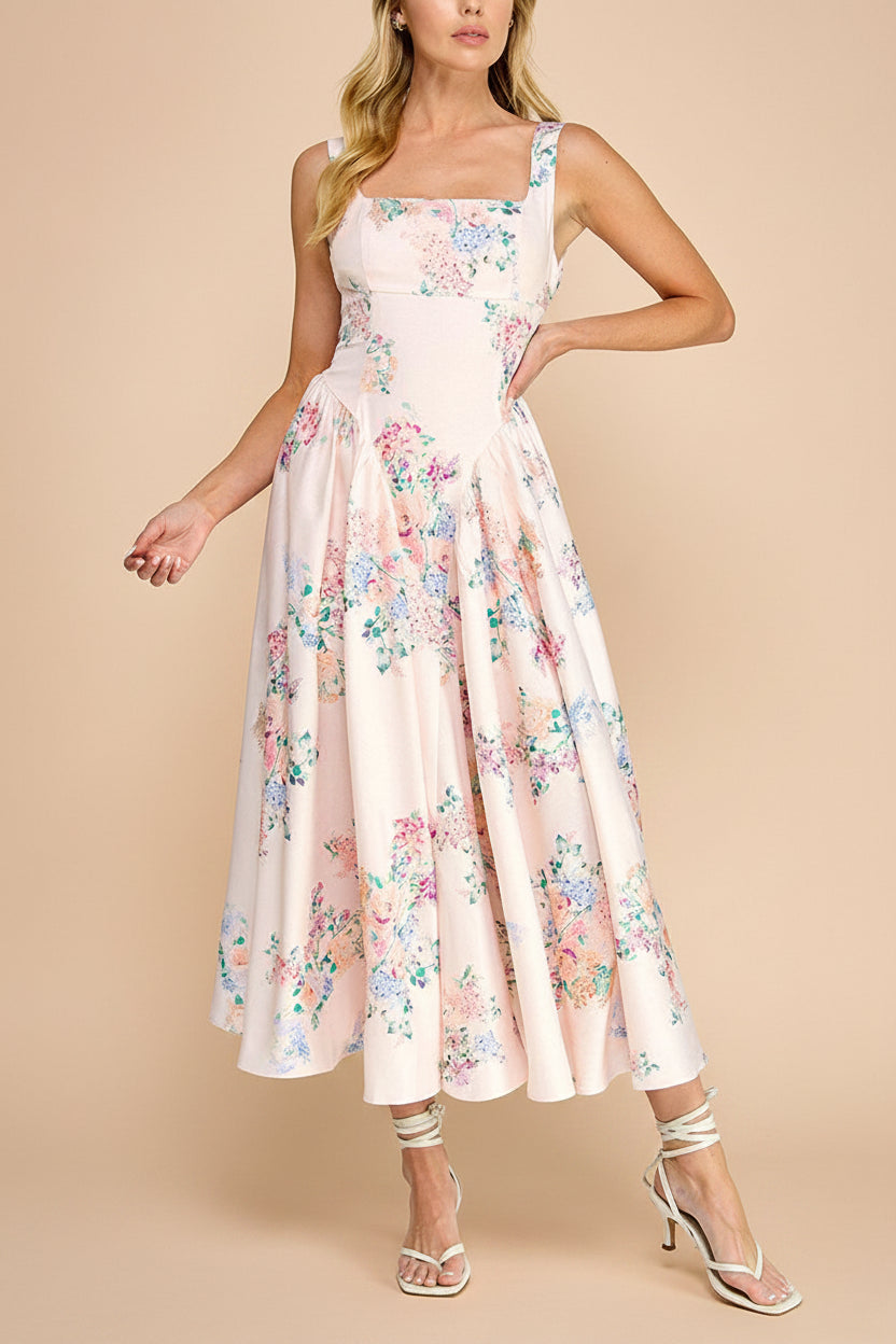 front  view of a woman wearing Leah A-Line Midi Pink Floral Dress with Ribbons at Back from Boutique 1861