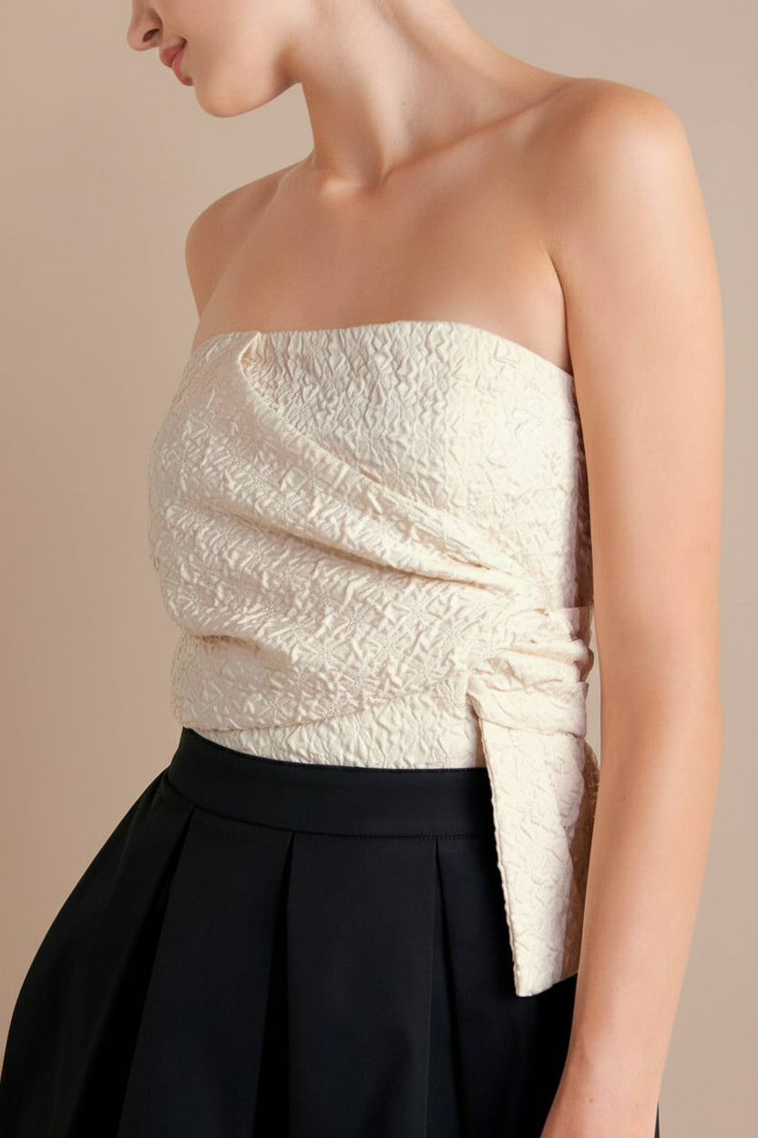 close-up of a woman wearing Lindsay Midi Strapless Dress with Draped Bodice from Boutique 1861