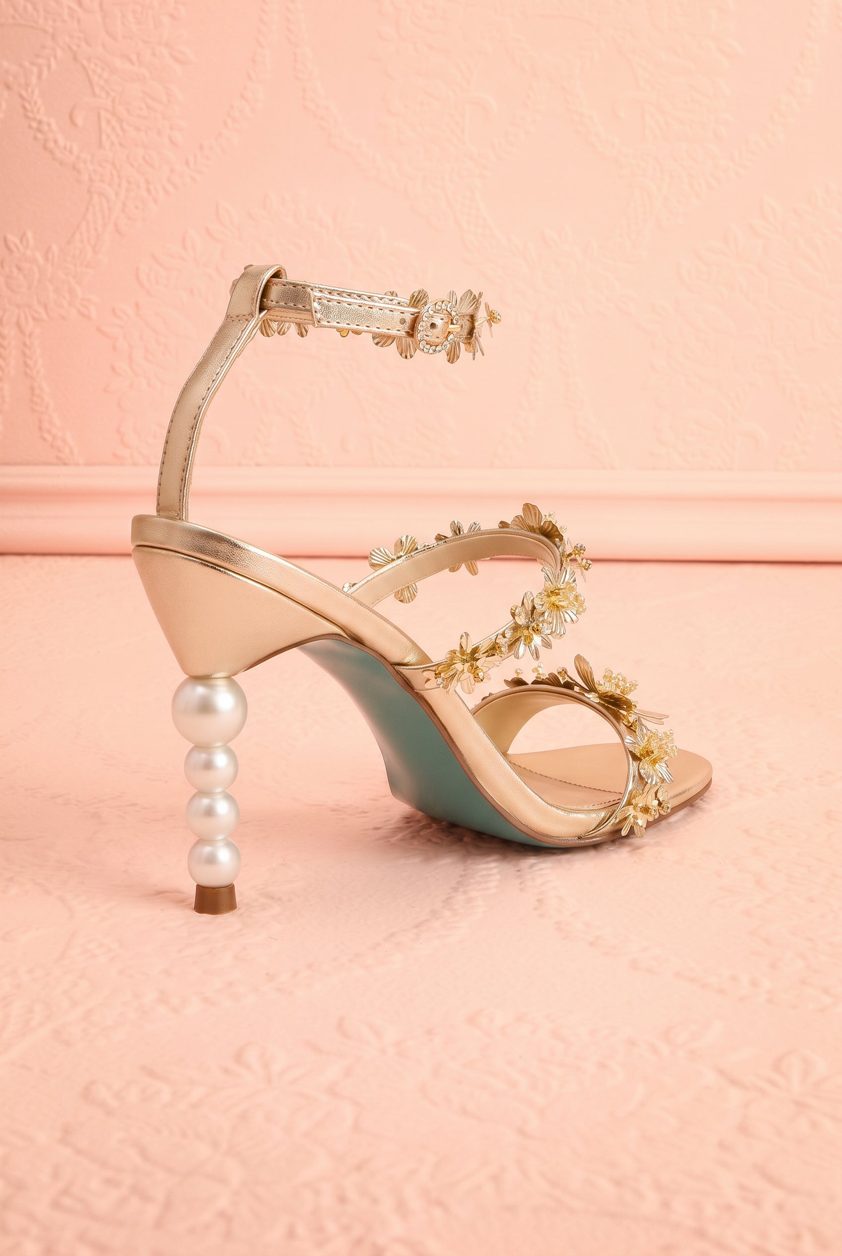 Backview Lorra Gold Floral Sandals with Pearl Heel from Betsey Johnson at boutique 1861