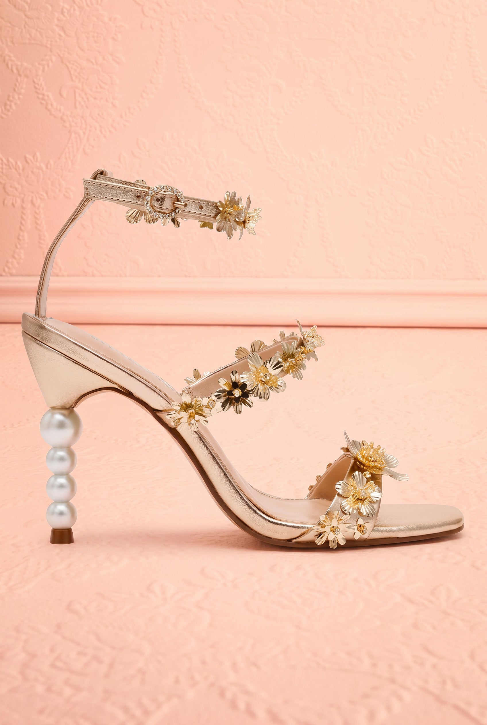 Sideview Lorra Gold Floral Sandals with Pearl Heel from Betsey Johnson at boutique 1861