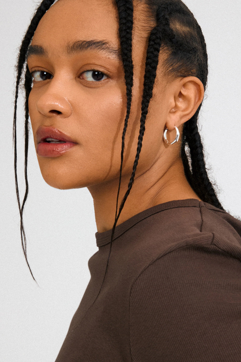 woman wearing a Pair of silver hoop earrings MAITLAND from Pilgrim available at la petite garçonne