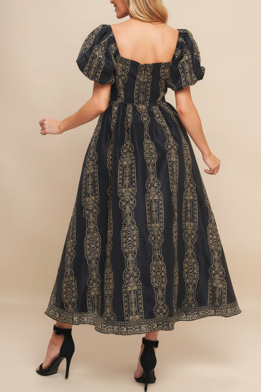 back view of a woman wearing Marcie Midi Dress with Puffs Sleeves from Boutique 1861