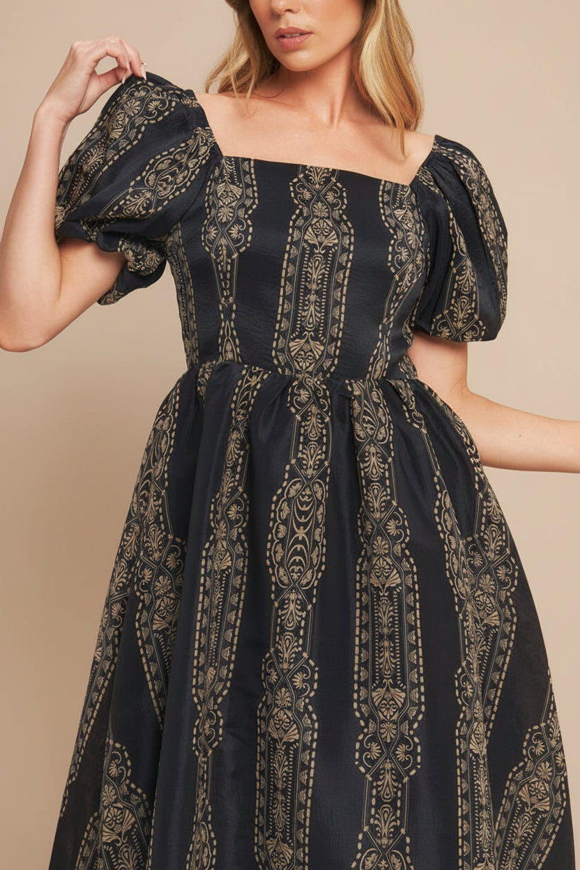front of a woman wearing Marcie Midi Dress with Puffs Sleeves from Boutique 1861