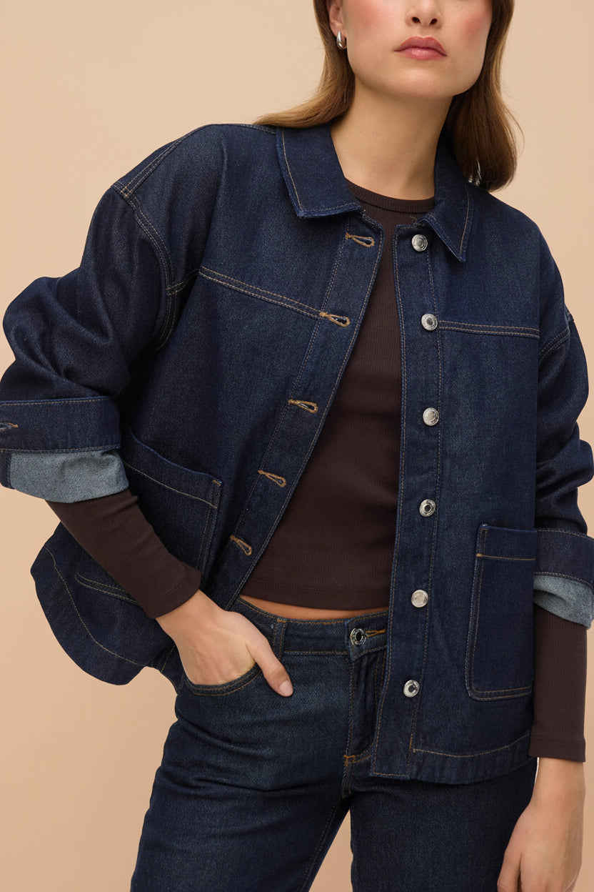 a woman wearing Matera Dark Wash Denim Button-Up Jacket with Pockets from La petite garçonne