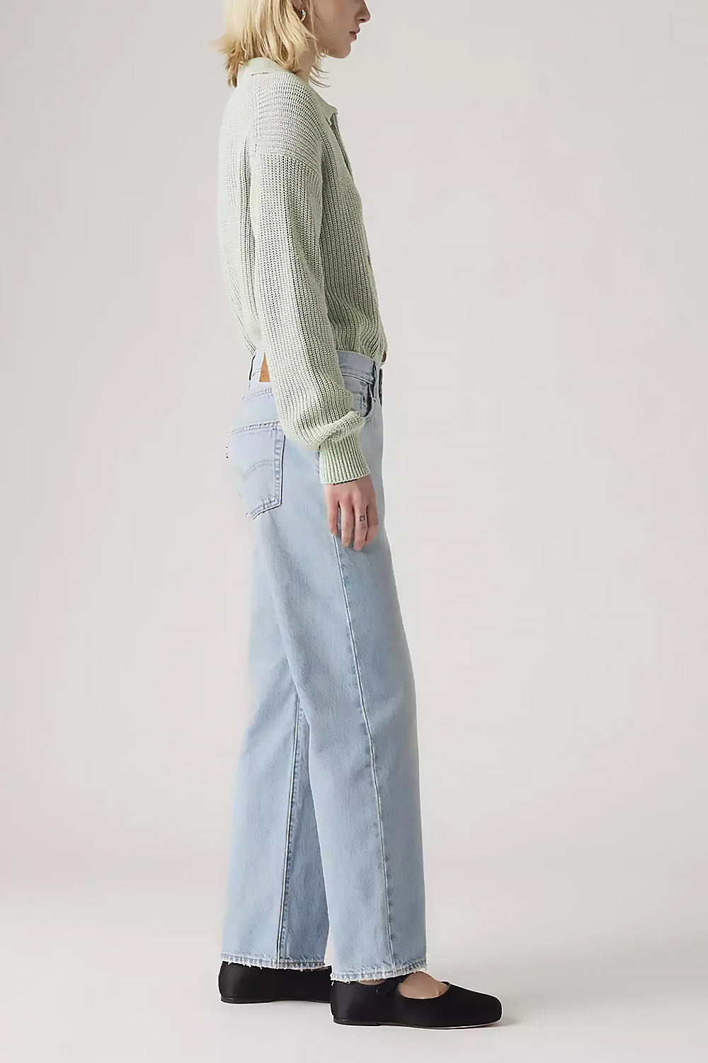 side of a woman wearing Matheran Light Blue Ankle Length Denim Pants from La petite garçonne