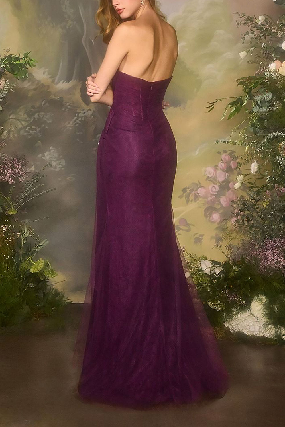 back of a woman wearing Melora Purple Strapless Maxi Lace Dress with High Slit from Boutique 1861 