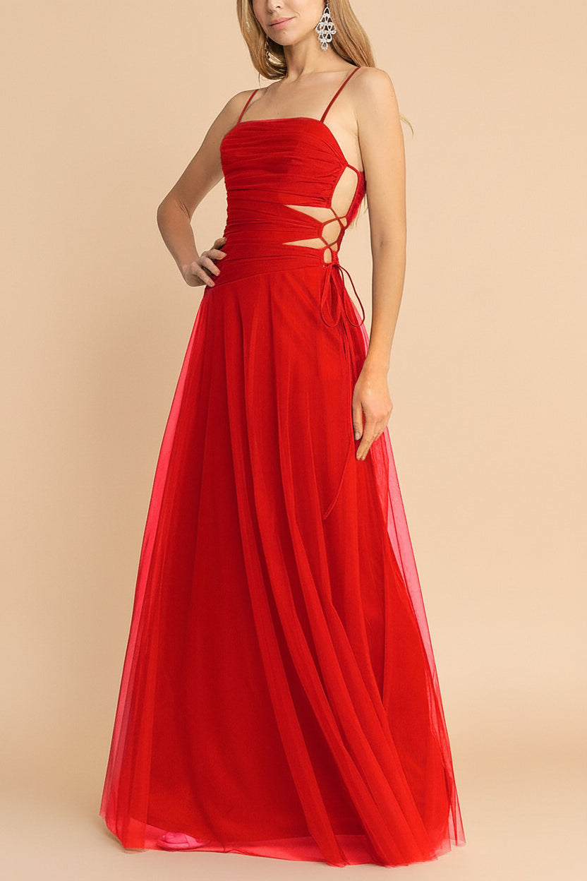 side of a woman wearing Micah Red Tulle Maxi Dress with Ruched Bodice and Side Cutouts from Boutique 1861 