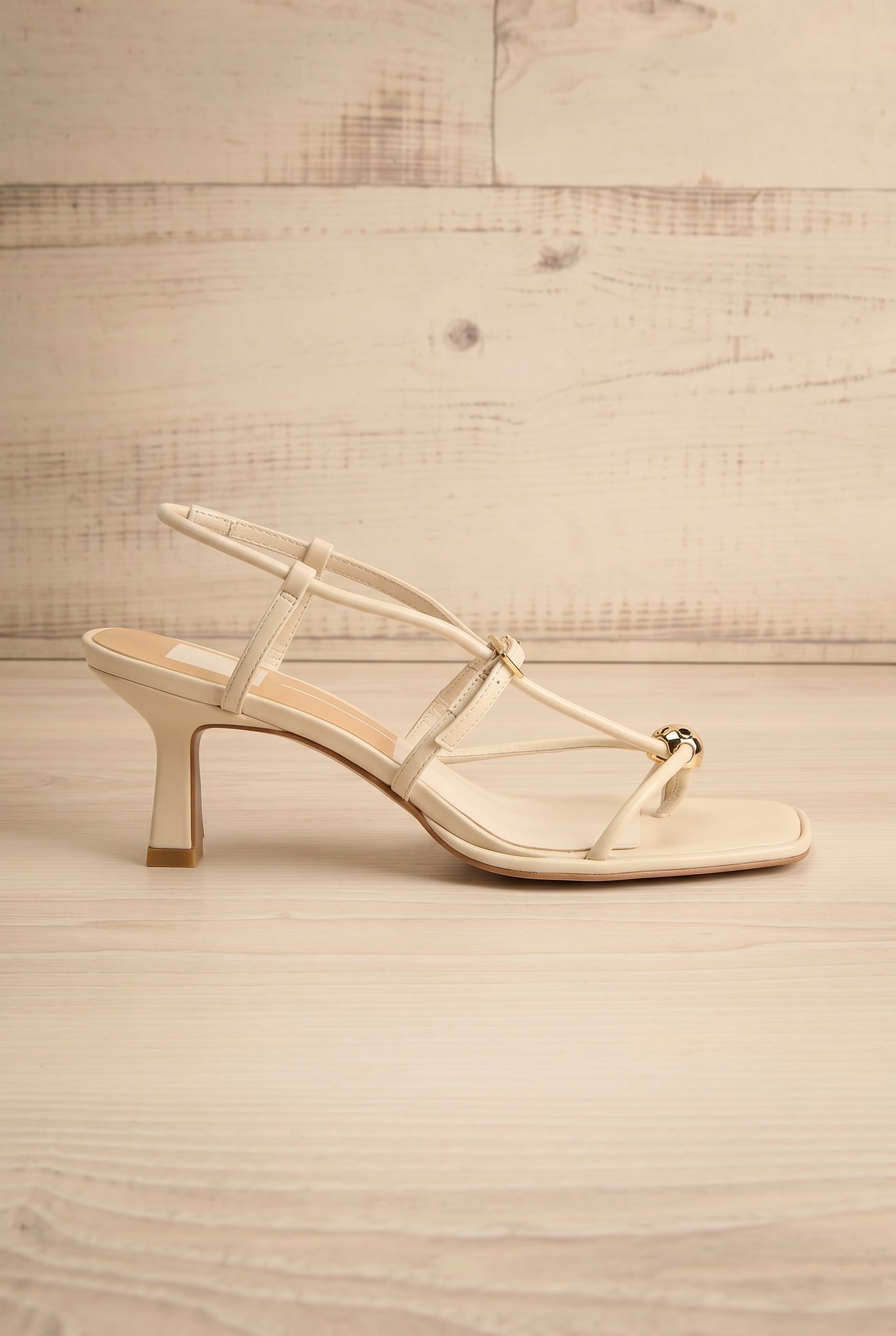 Sideview Mylee Ivory Strappy Leather Sandals with Sculptural Heel by Dolce Vita at la petite garçonne