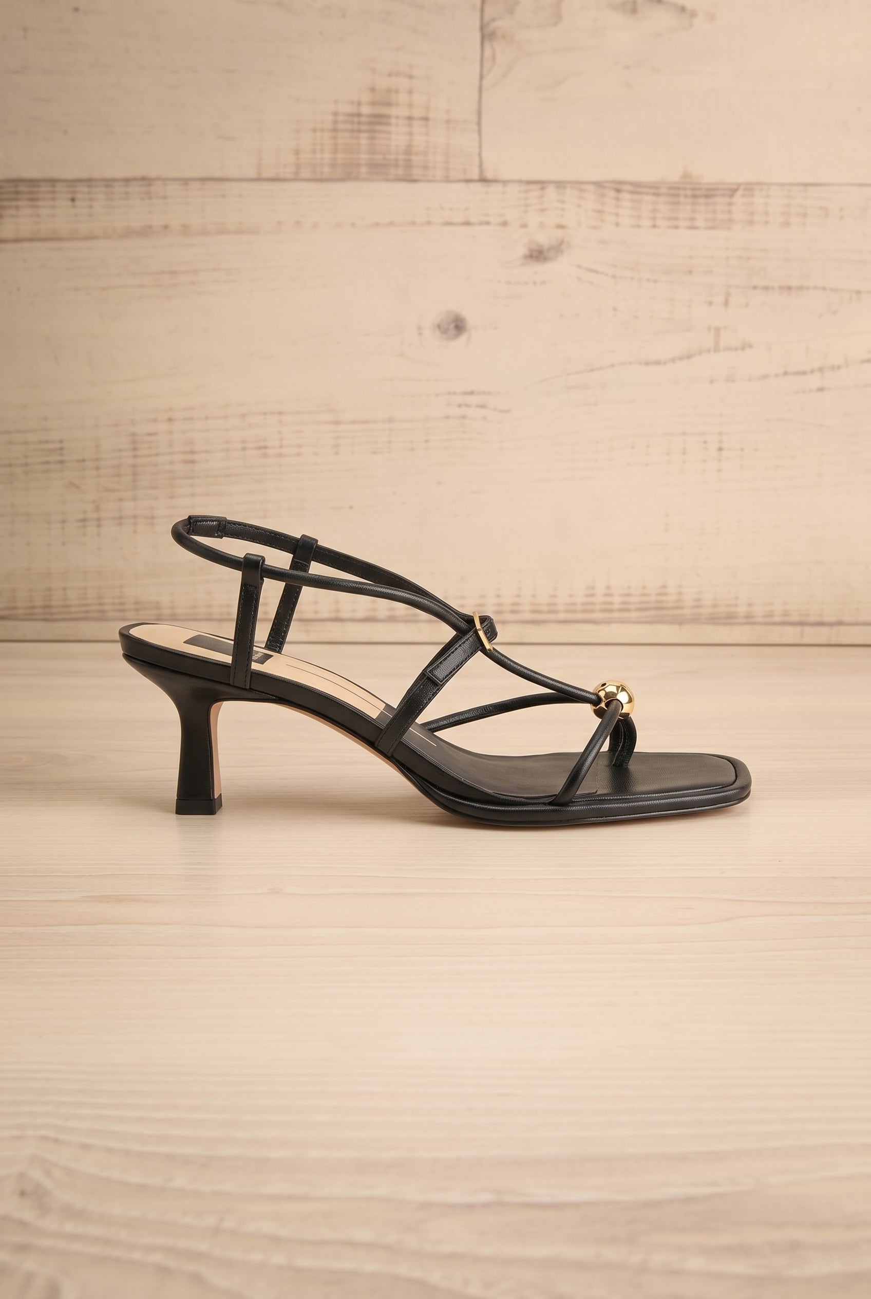 Sideview Mylee black Strappy Leather Sandals with Sculptural Heel by Dolce Vita at la petite garçonne