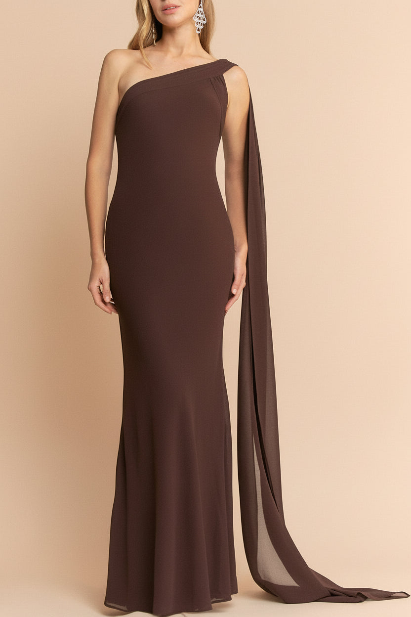 Front view of a Woman wearing Makarim Maxi Brown One Shoulder Dress from boutique 1861