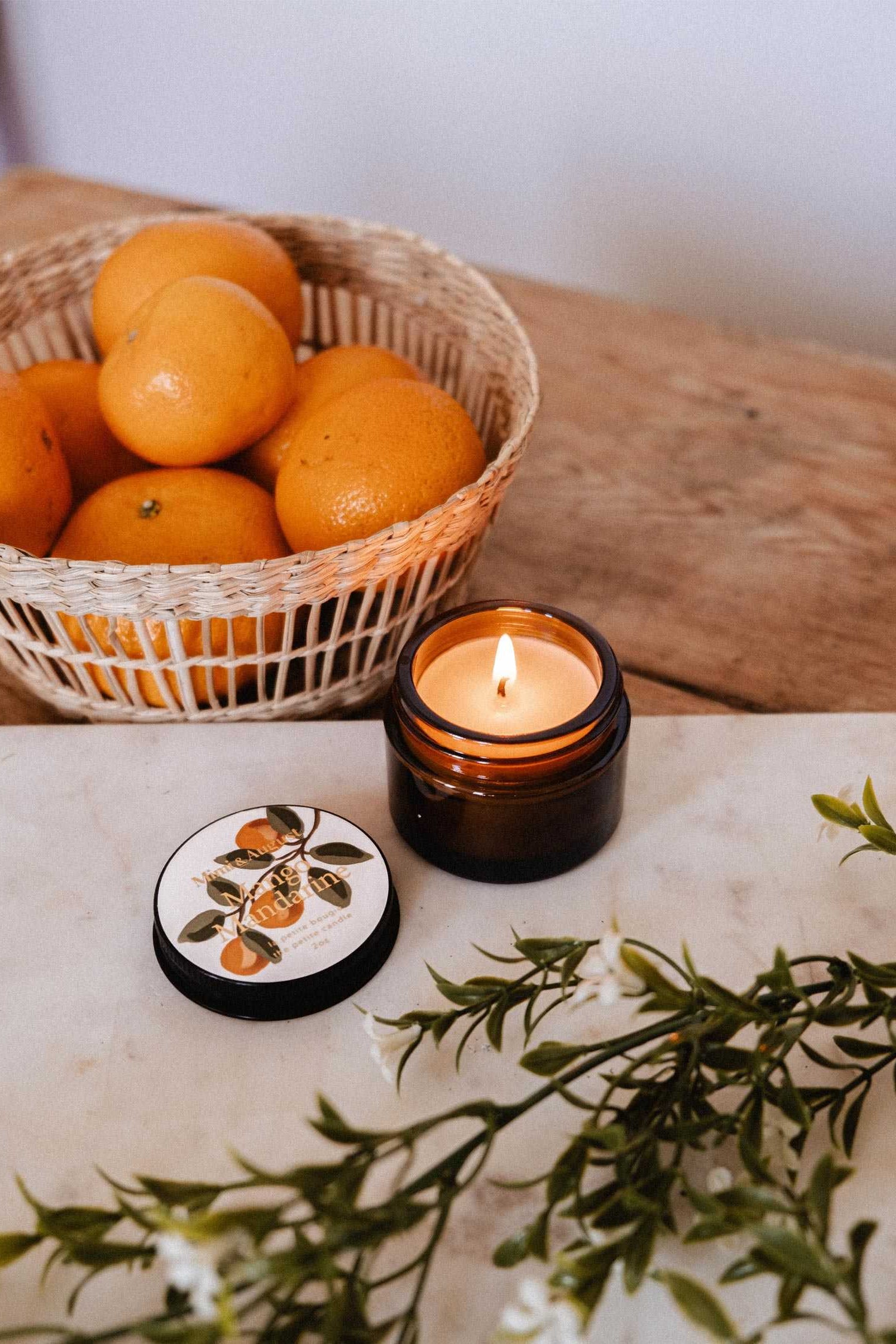 lifestyle view of Mango Mandarine Candle at Maison garçonne