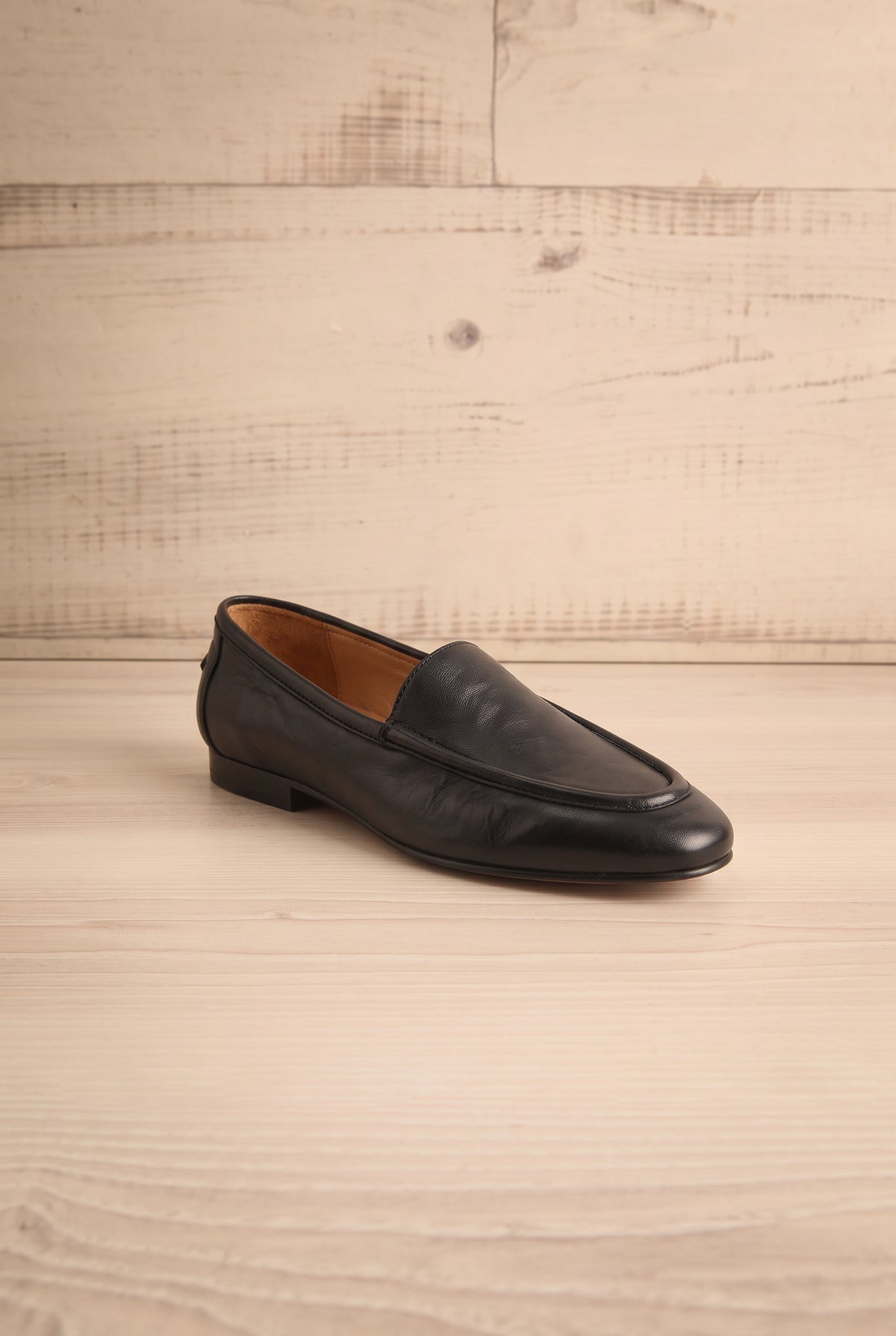 front view of Matty Black Leather Round Toe Loafer Shoes at La petite garçonne
