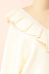 Miaro Ivory Ruffled V-Neck Knit Sweater | Boutique 1861 side close-up