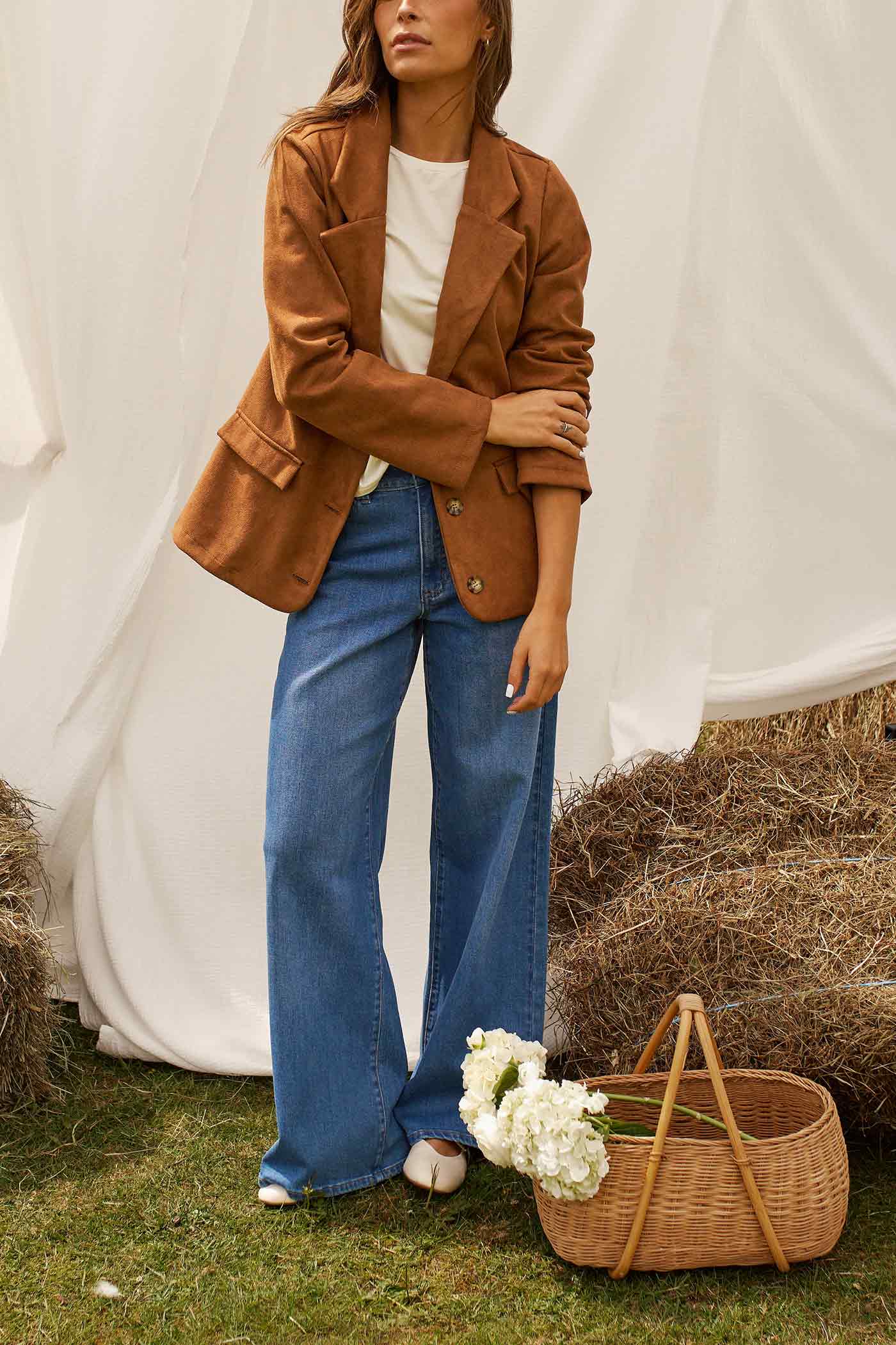 view of a woman wearing Miley Blazer Caramel Faux Suede by Dailystory from La petite garçonne