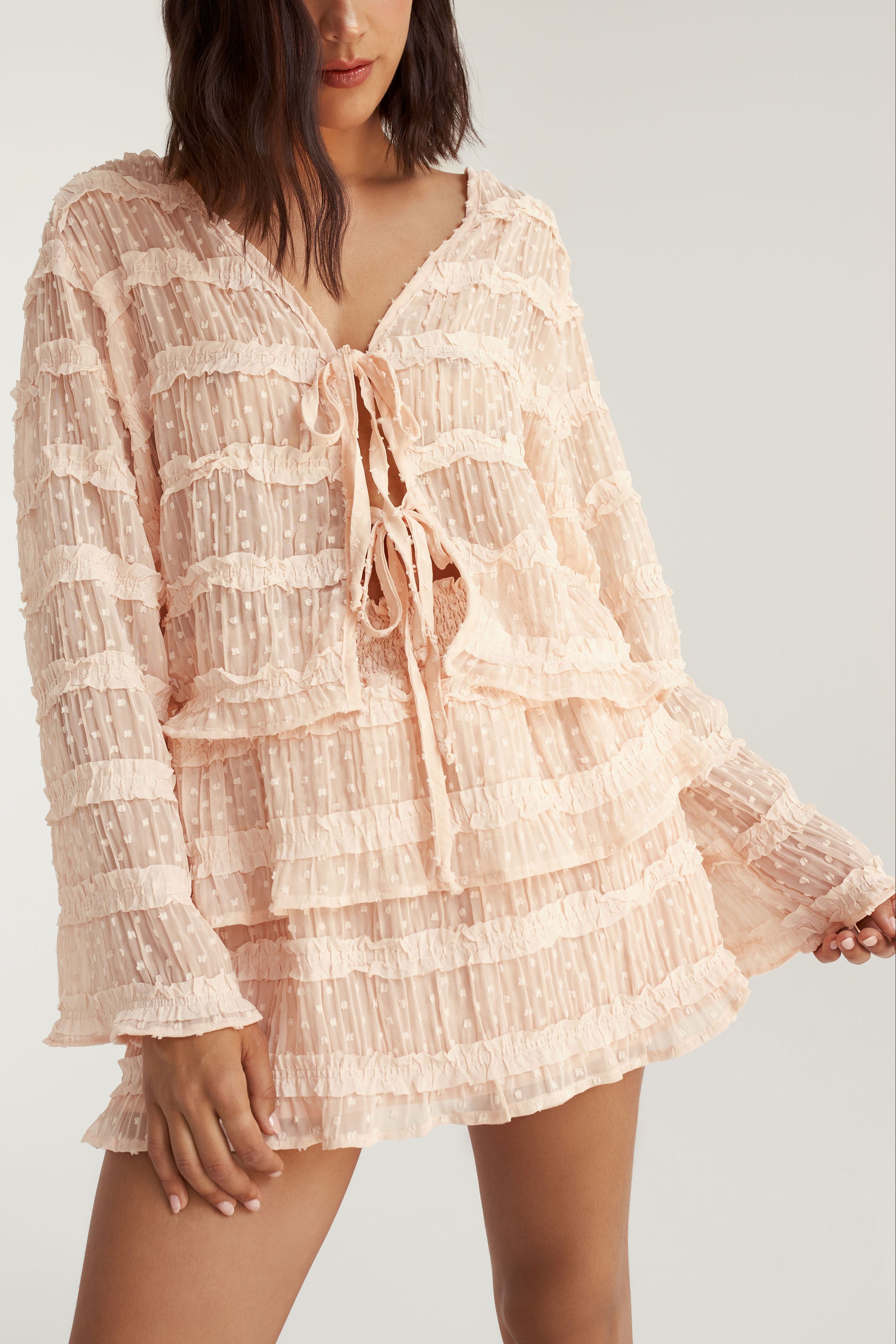 woman wearing Millie Blouse Pink Long Sleeves Top with Ruffles by Dailystory from la petite garçonne