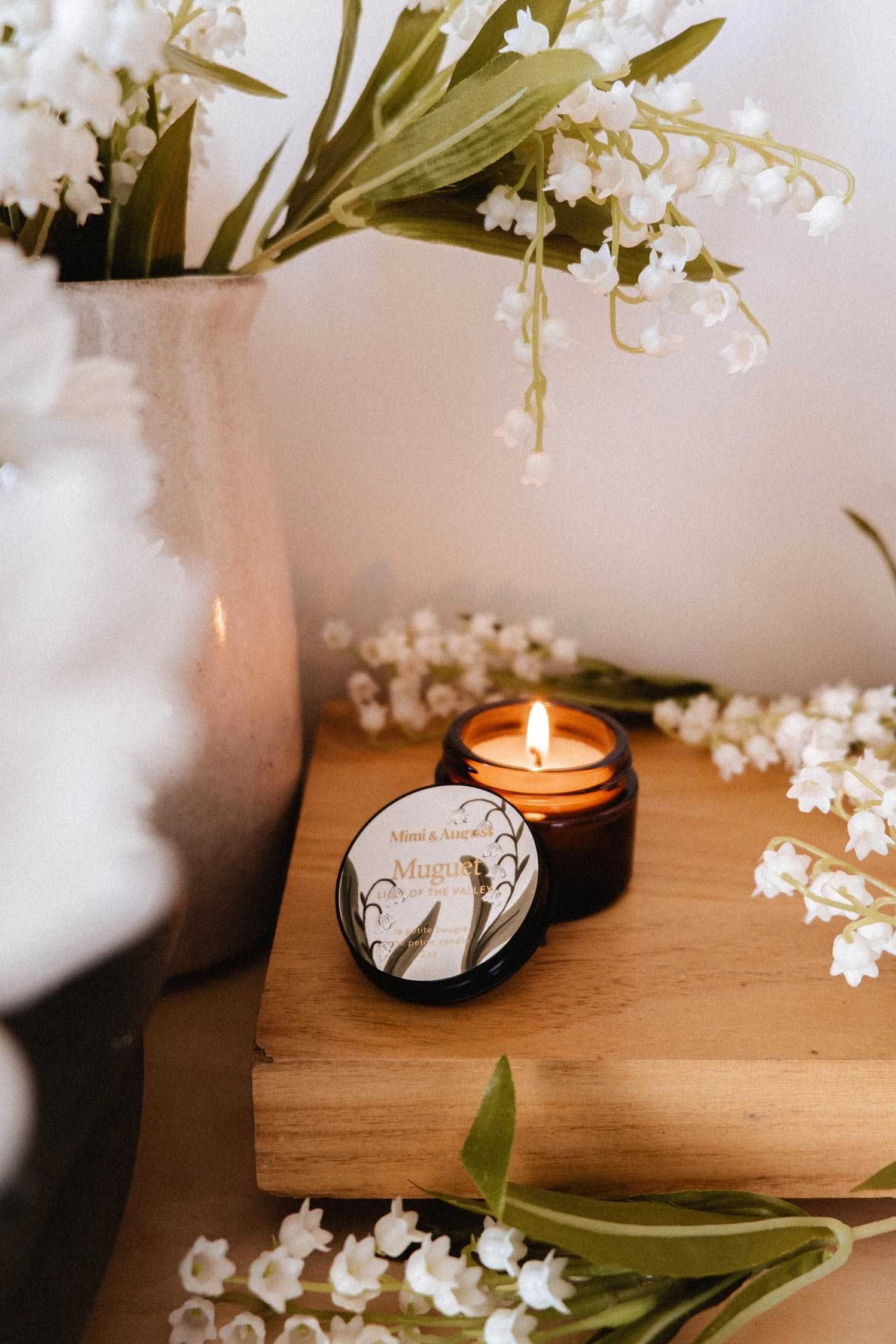 lifestyle view of Muguet Candle at Maison garçonne