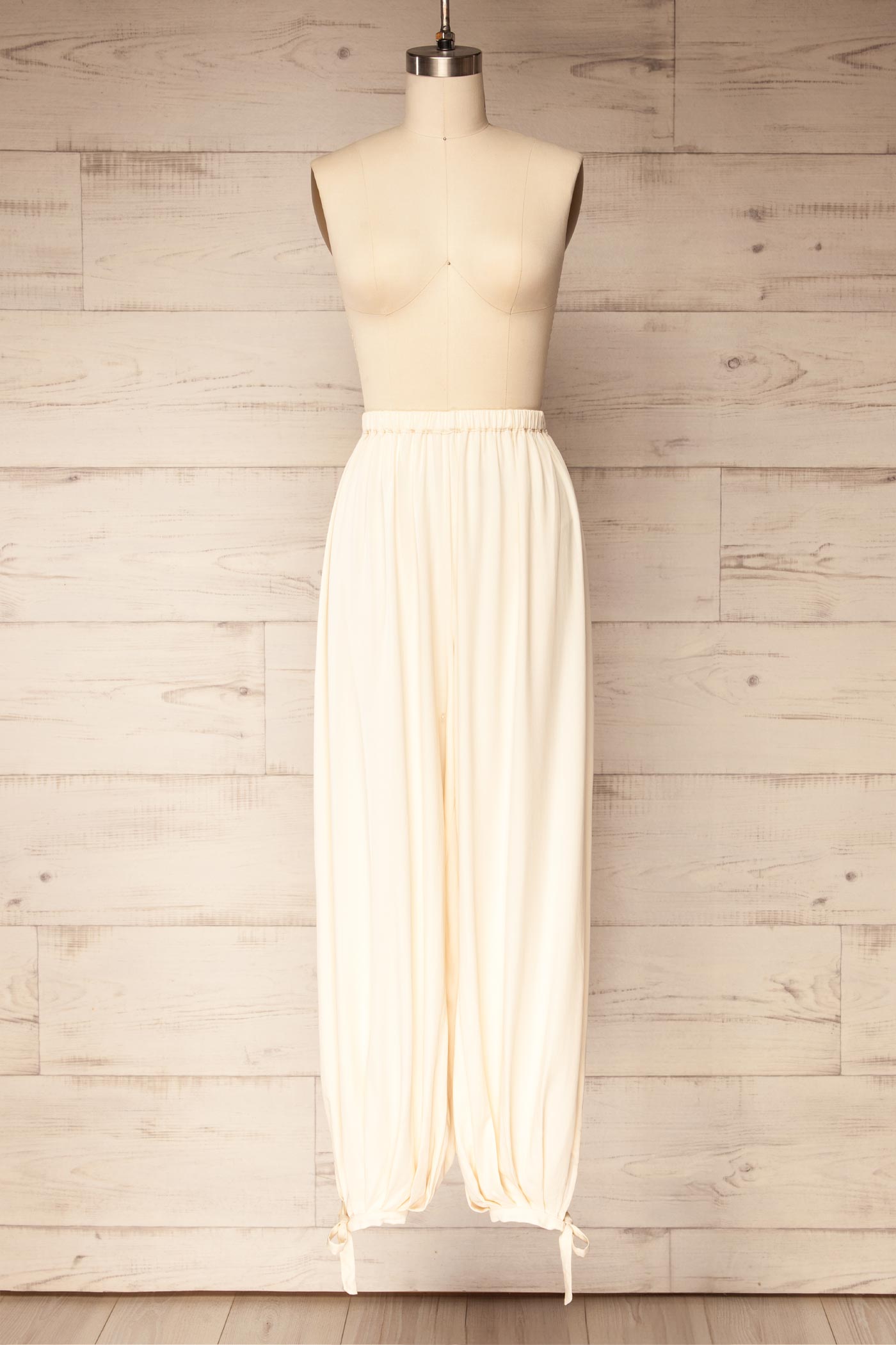 Mumbai Beige Parachute Pants with Ankle Bows | La petite garçonne front view
