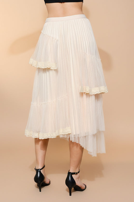 back view of a woman wearing Nadege Pink Maxi Skirt with Lace Trim Detail from Boutique 1861