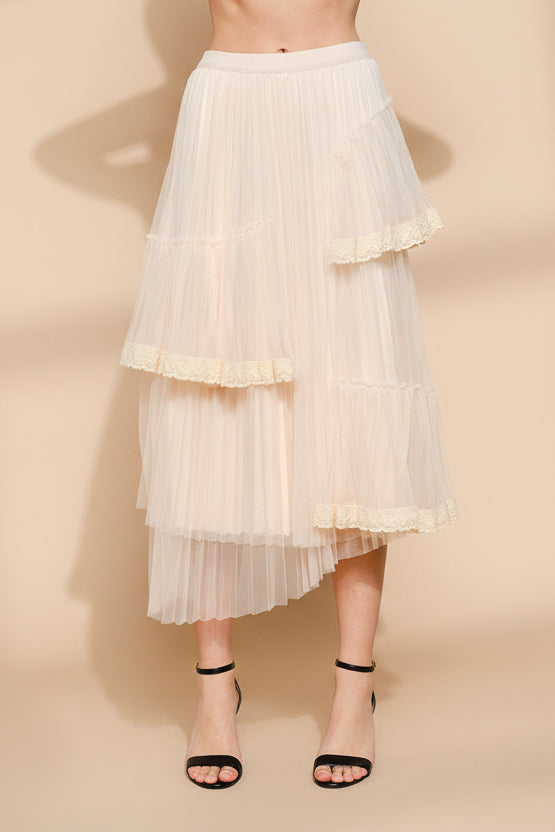 front view of a woman wearing Nadege Pink Maxi Skirt with Lace Trim Detail from Boutique 1861