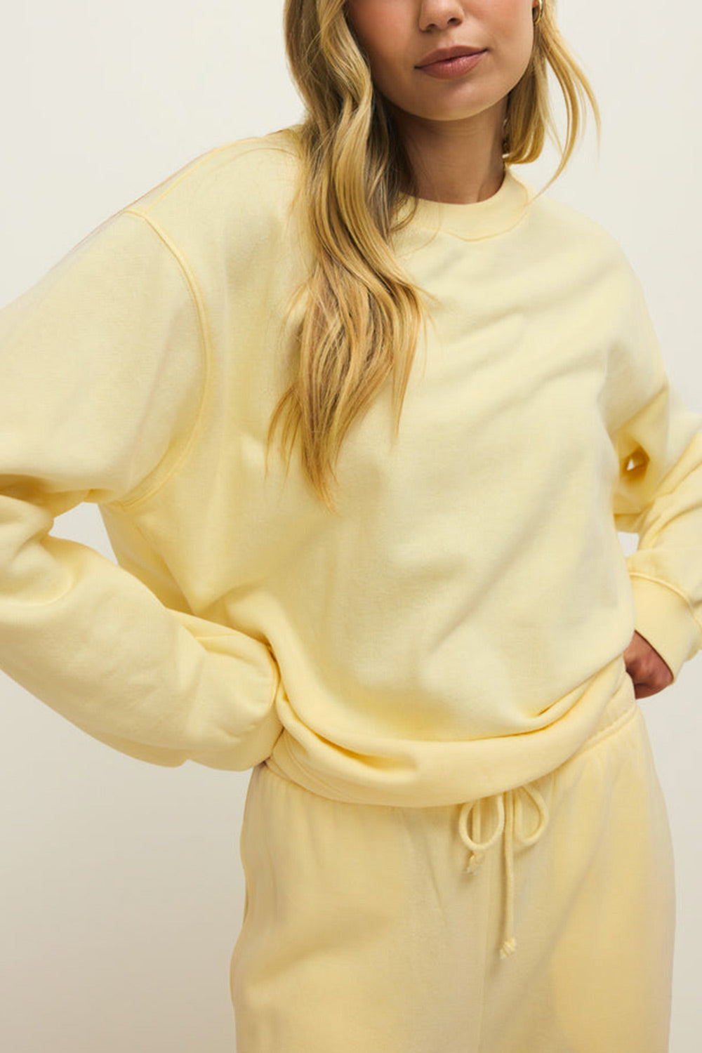 woman wearing Nesna Yellow Oversized Sweatshirt from La petite garçonne 