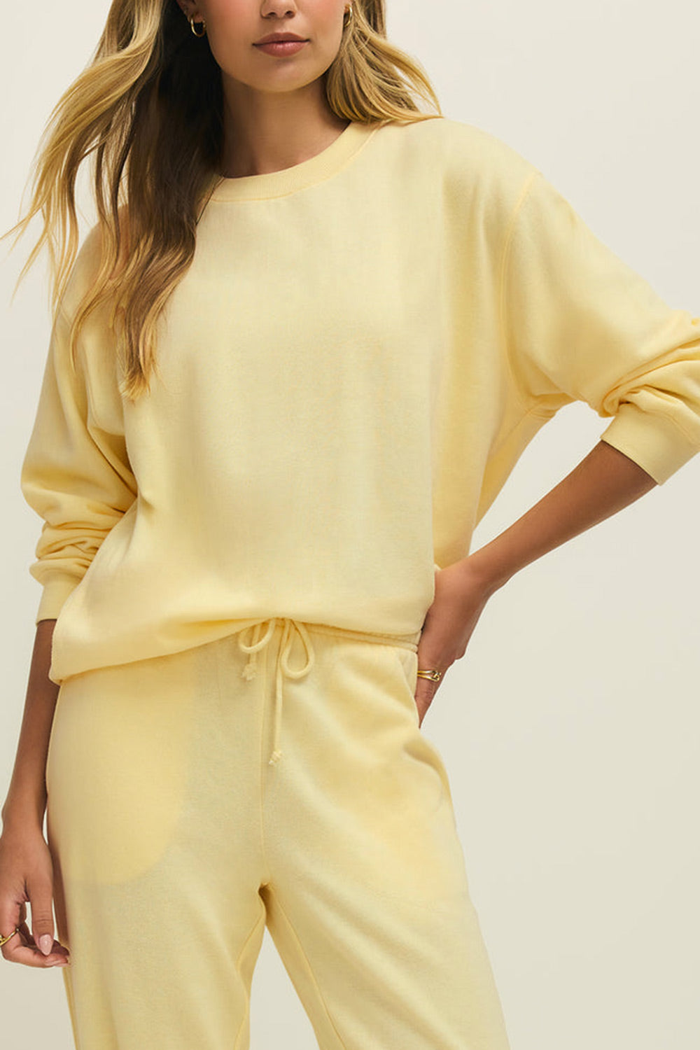 a woman wearing Nesna Yellow Oversized Sweatshirt from La petite garçonne 