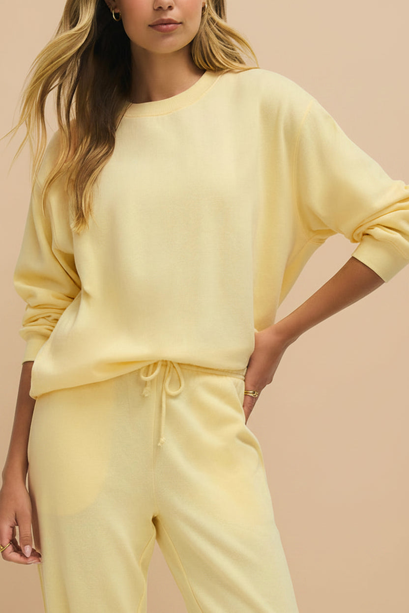 a woman wearing Nesna Yellow Oversized Sweatshirt from La petite garçonne 