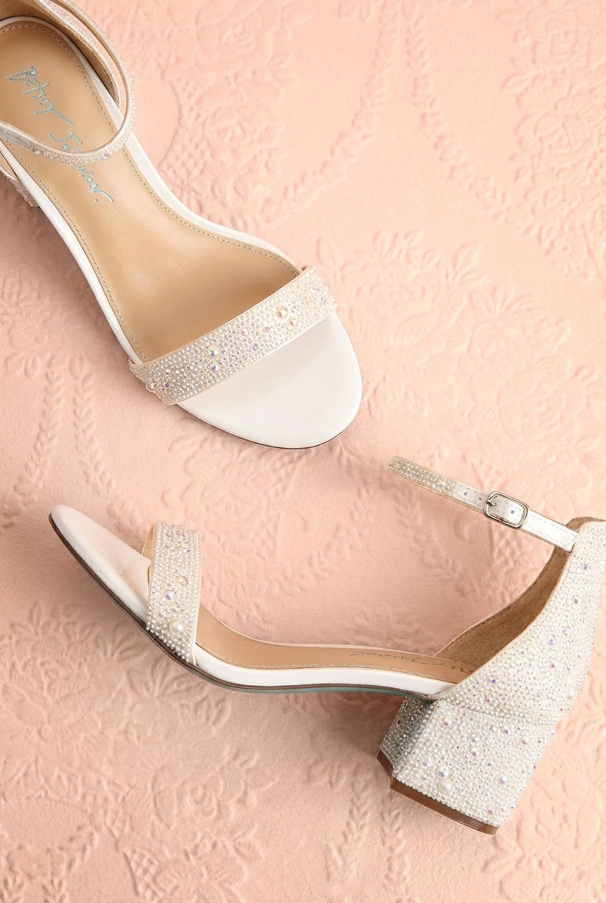 Top view of the White Pearl Embellished Block Heel Sandals Orchidee from Betsey Johnson with a slingback design at boutique 1861