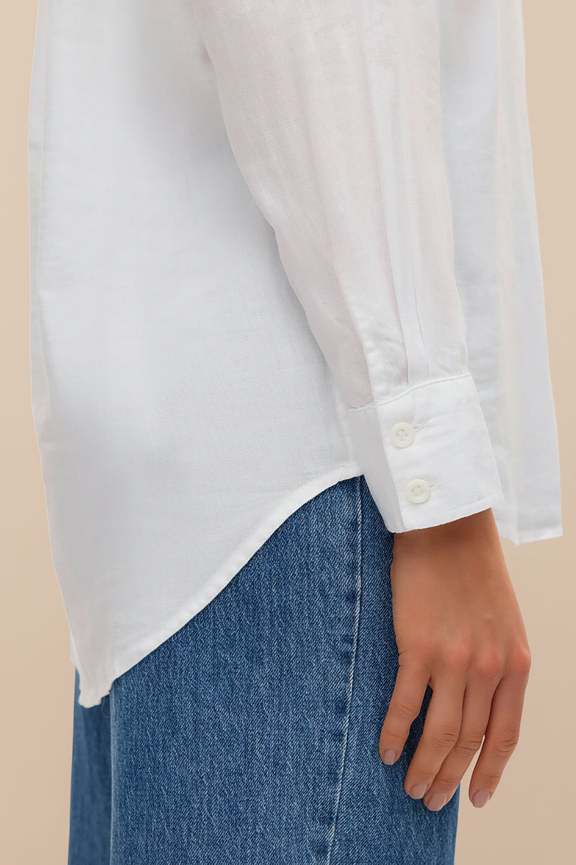 close-up of a woman wearing Otranto White Oversized Blouse with Long Sleeves from La petite garçonne