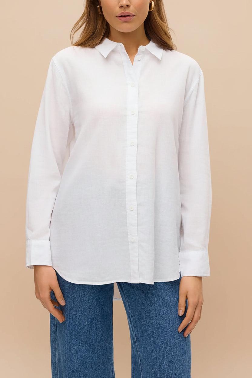 front of a woman wearing Otranto White Oversized Blouse with Long Sleeves from La petite garçonne