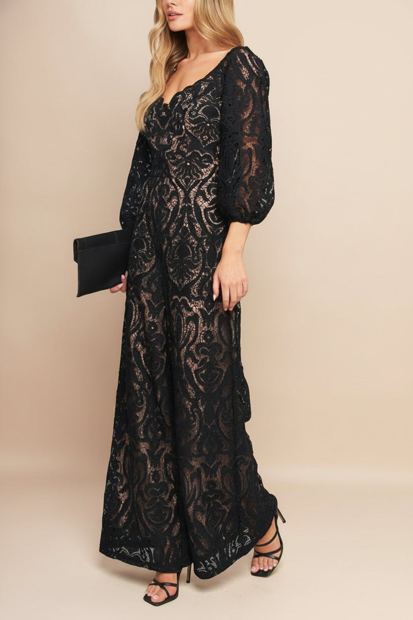 side view of a woman wearing Penny Black Lace Jumpsuit with Wide-Leg from Boutique 1861