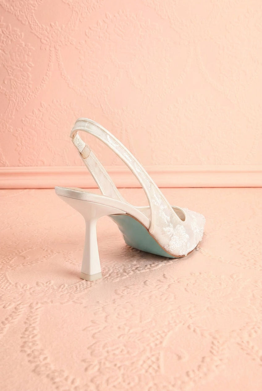 Back view of the White Slingback Heels with Embroidery Perseide from Betsey Johnson with a slingback design at boutique 1861