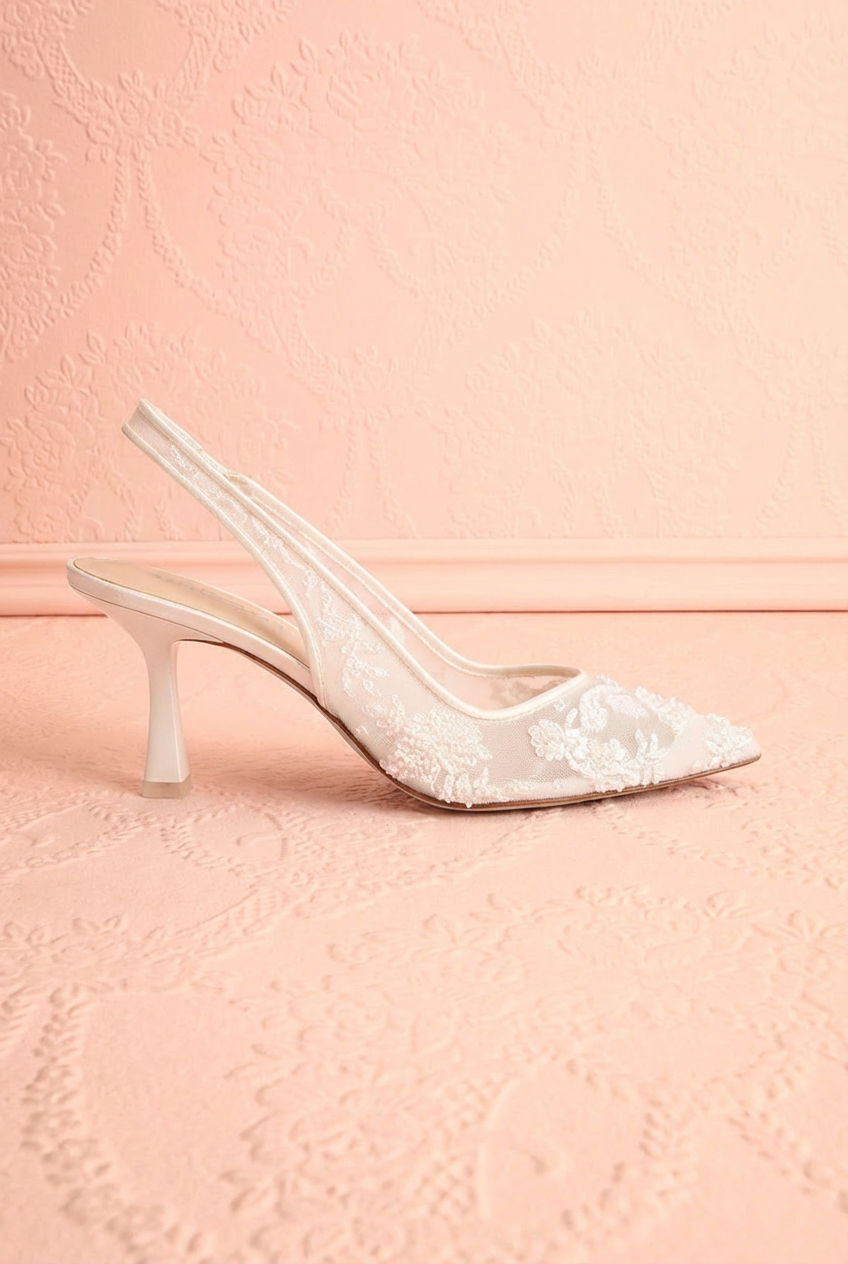 Side view of the White Slingback Heels with Embroidery Perseide from Betsey Johnson with a slingback design at boutique 1861