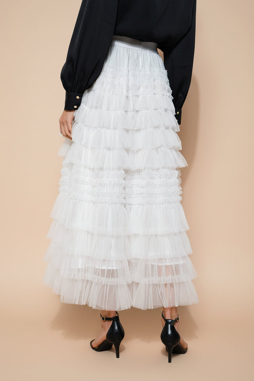 back view of a woman wearing Poema White Maxi Tulle High-Waisted Skirt from Boutique 1861