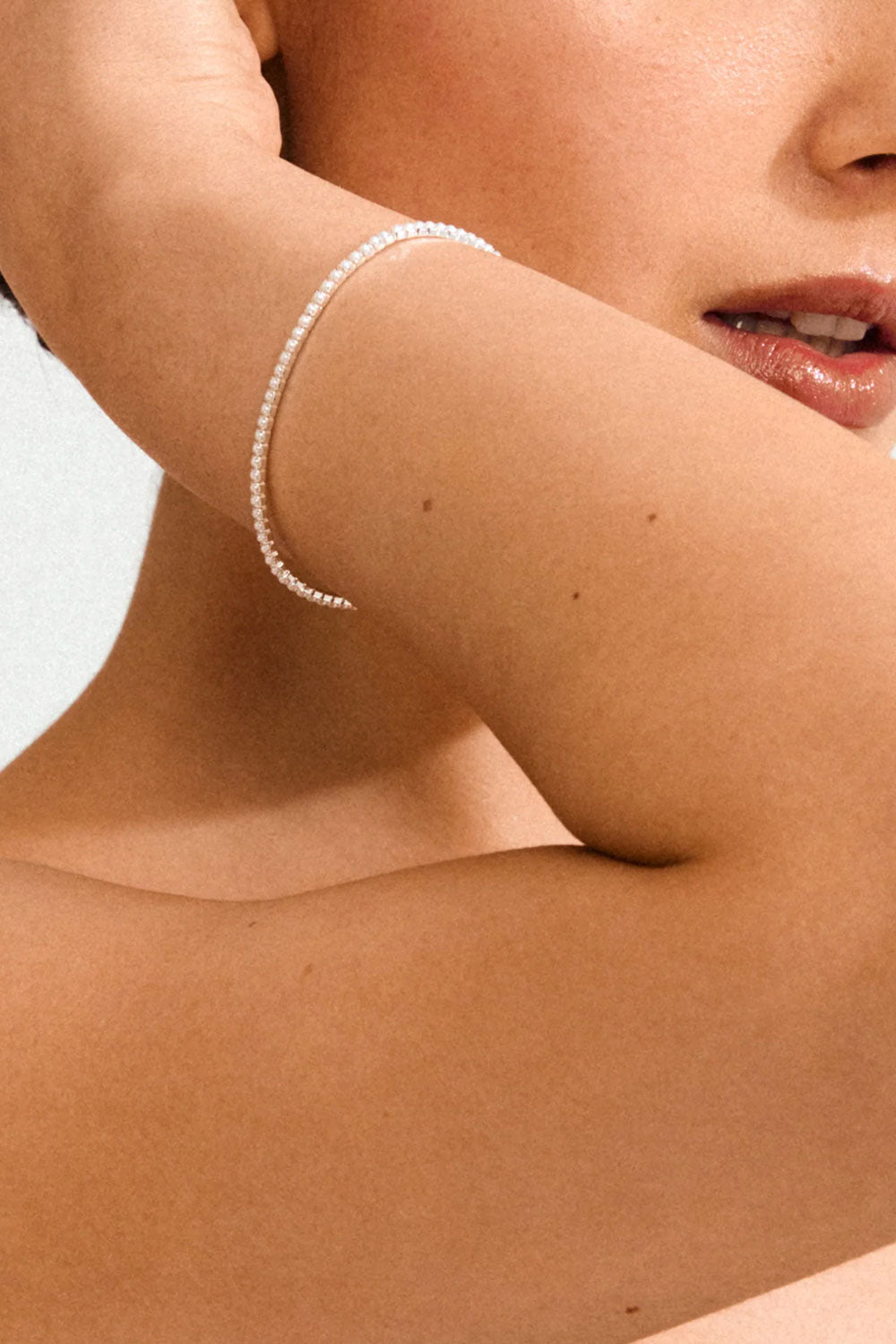 Photo of a model wearing a beaded silver bracelet ARASHIA from Pilgrim available at la petite garçonne in Montreal