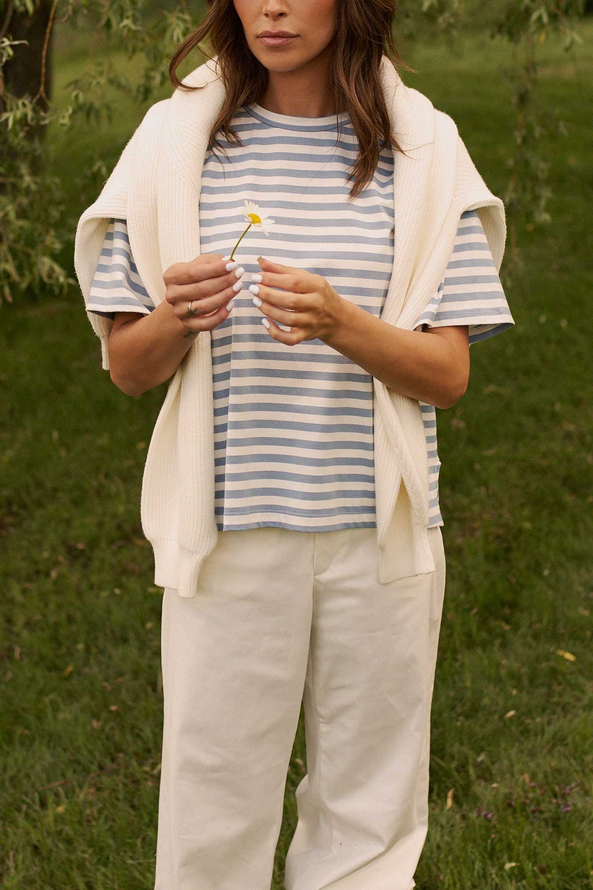a woman wearing Poppy Blue Striped Cropped Cotton T-Shirt by Dailystory from La petite garçonne