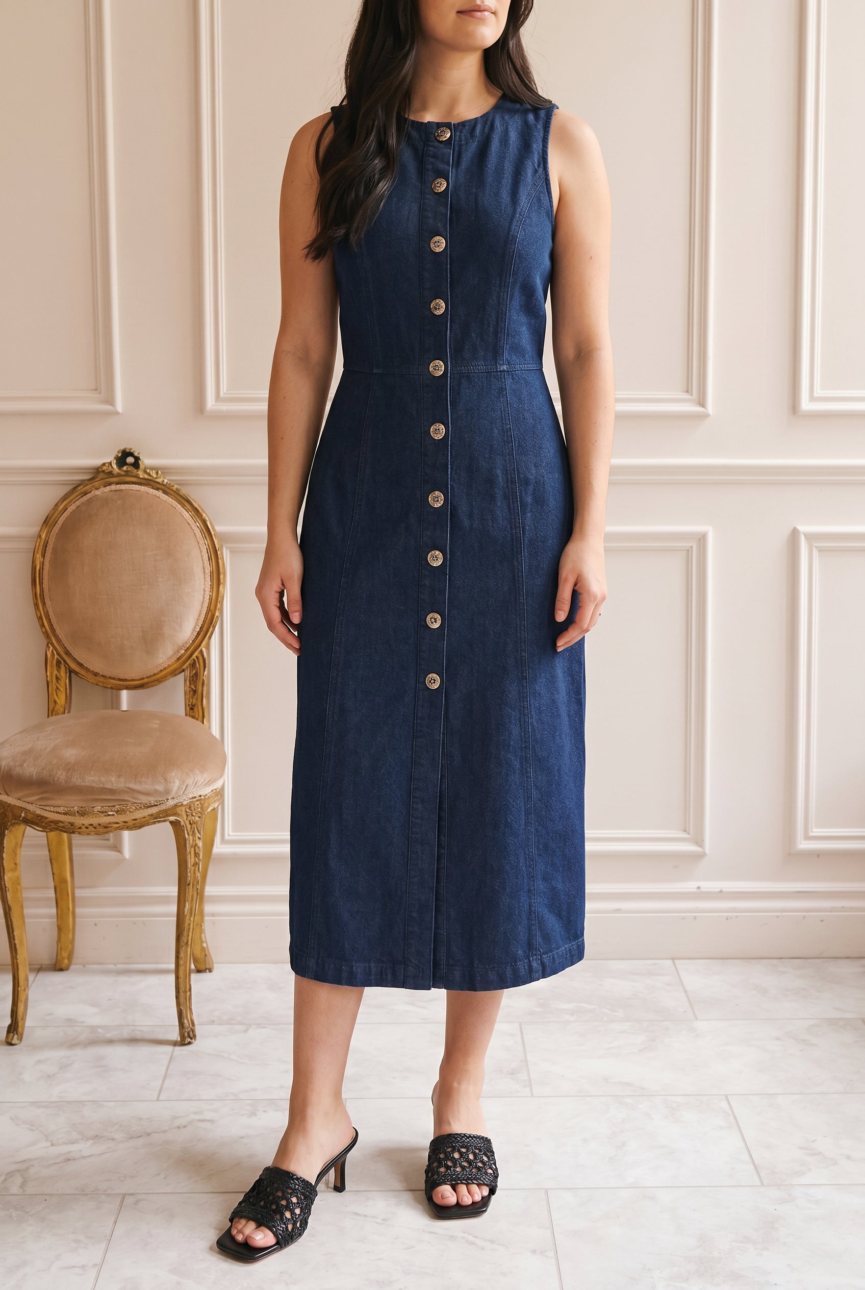 Woman wearing Potenza Sleeveless Denim Midi Dress at la petite garçonne
